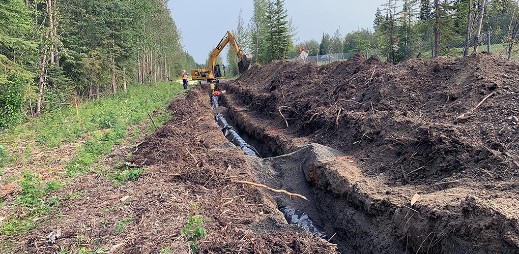 laying pipe on moose creek water expansion project